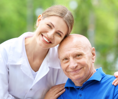 caregiver woman embracing an elderly man